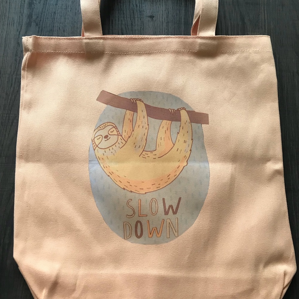 Slow down tote bag